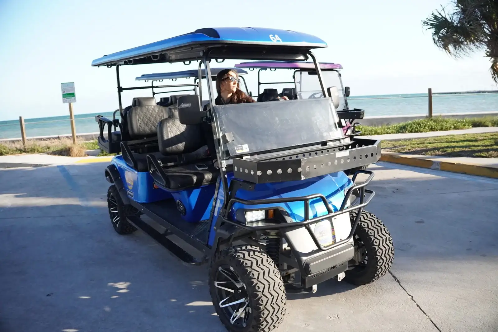 Paradise Rentals KW blue 6-seater golf cart